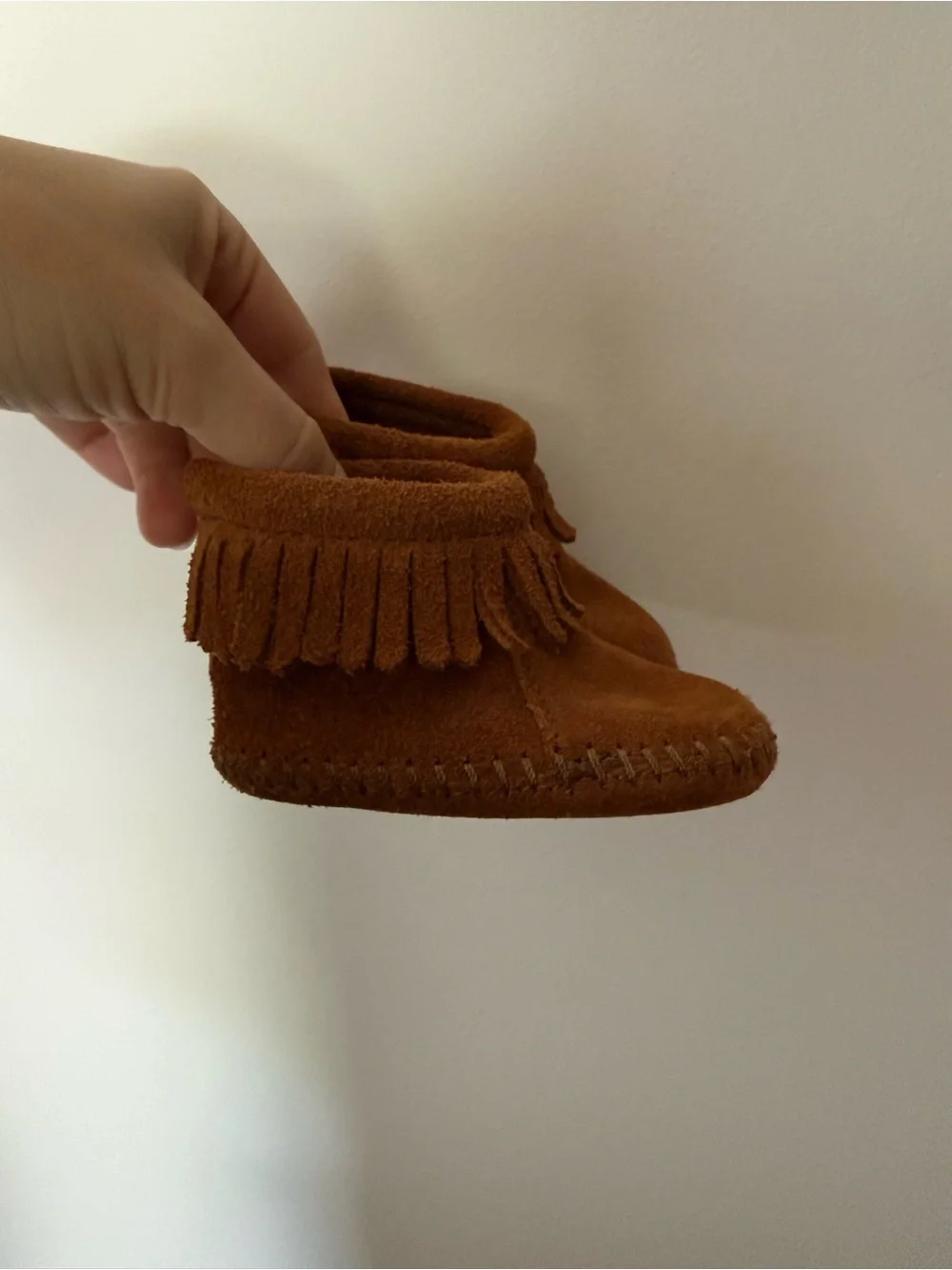 Minnetonka Kids Suede Fringe Moccasins in Brown